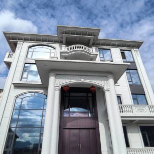 梅州白麻别墅外墙干挂石材效果示例