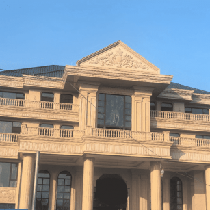 梅州黄金麻别墅外墙干挂石材效果示例